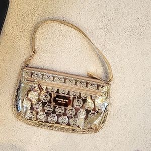 Michael Kors gold wristlet